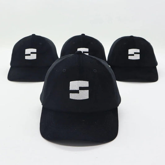 black “splattlestudio” dad hat